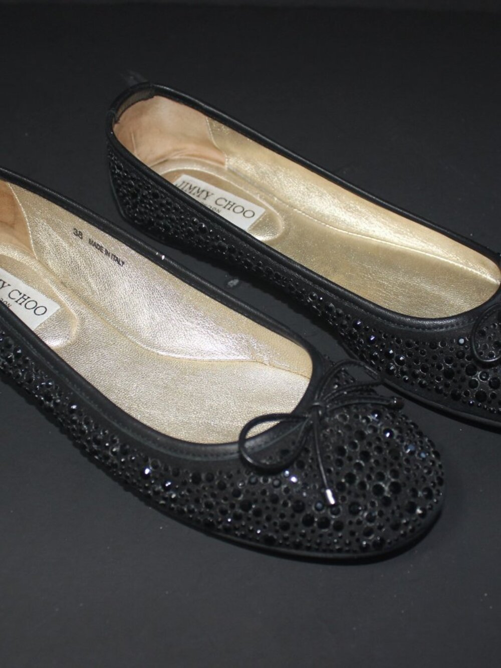 JIMMY CHOO BLK CRYSTAL LEATHER BALLET FLATS  METAL PLAQUE ON HEEL SZ (38) 7.5-8